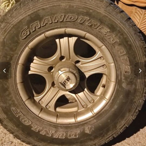 Aluminum rims for Mazda B2600 like new with hubcaps and security bolts