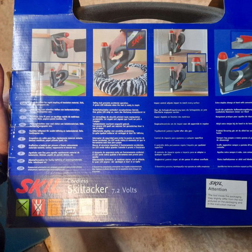 Skil 7.2V cordless nailer new with case and 2100AA staple