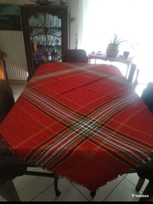 Traditional red woven tablecloth with checkered and geometric patterns, like new