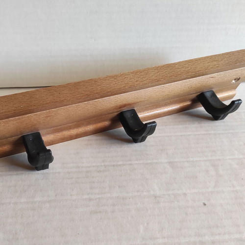 Wooden wall hanger with 4 black plastic hooks, new