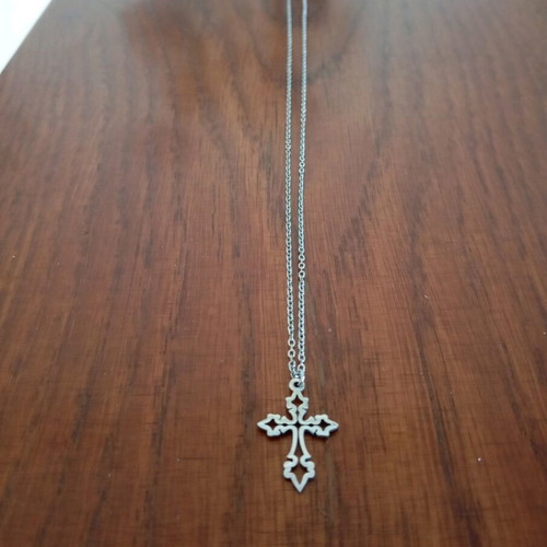 Steel cross like new, silver color
