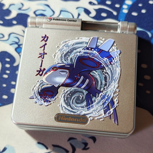 Silver Gameboy Advance SP shell with embossed Kyogre UV print