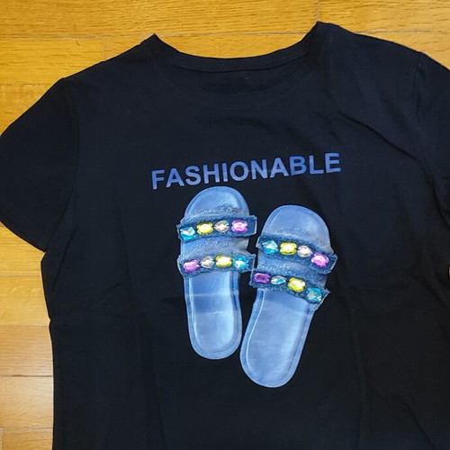 Black Graphic T-Shirt size M like new with sandal print and stones