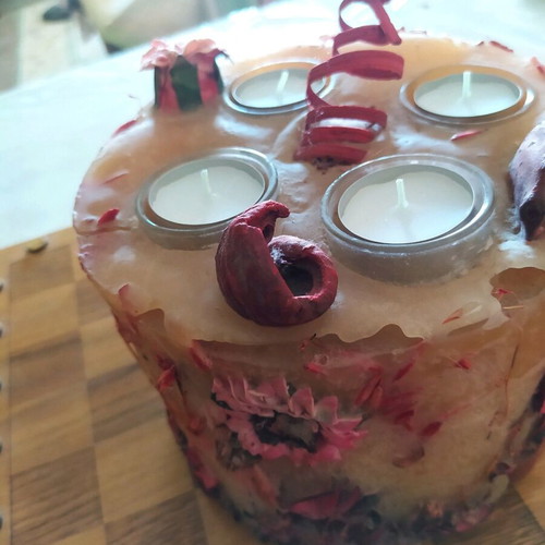 Decorative candle with dried flowers used