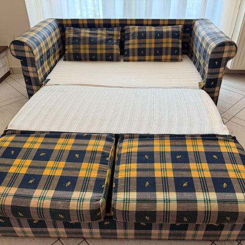 Vintage sofa bed and armchair set used, checkered fabric