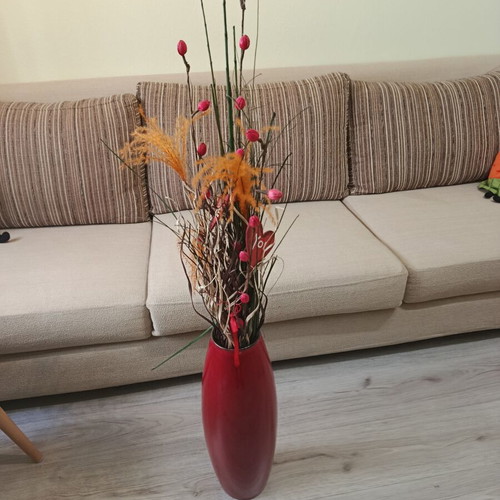 Red floor vase like new with all flowers