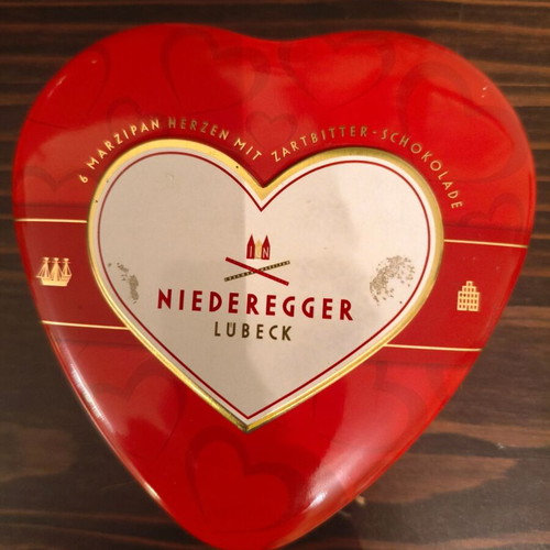 Maxim's and Niederegger used metal heart-shaped tins