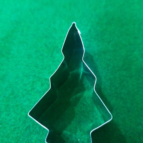 Cookie cutters with Christmas designs used