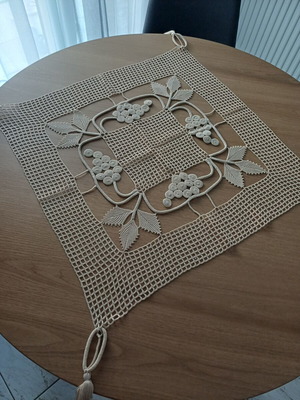 Beige table linen doily