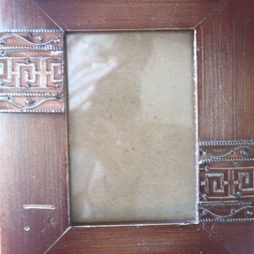 Brown photo frame used with small scratch