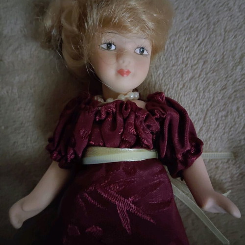 Porcelain doll 14.5cm like new