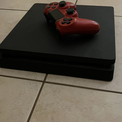 Sony PlayStation 4 Slim 500GB used with controller and GTA V