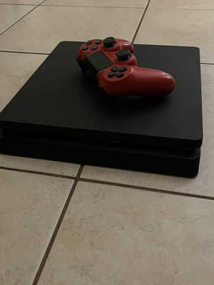 Sony PlayStation 4 Slim 500GB used with controller and GTA V