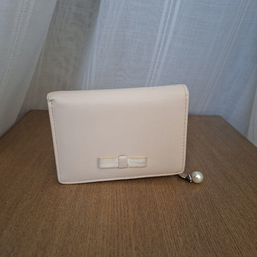 Wallet used with small marks on back