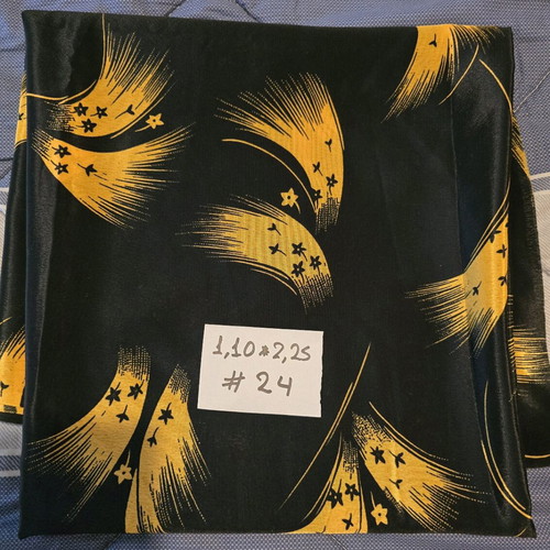 Sewing fabric new with yellow flowers on black background