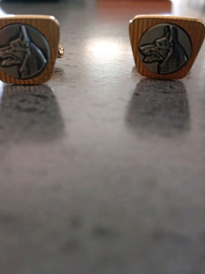 Bullet back cufflinks like new, gold color with wolf dog design