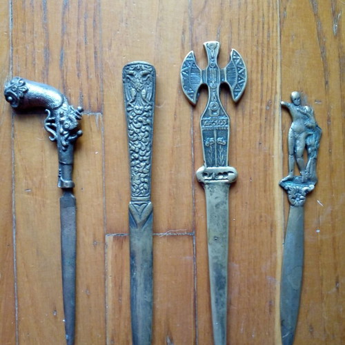 Brass letter openers used, set of 4 with 1970 themes
