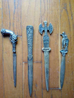 Brass letter openers used, set of 4 with 1970 themes