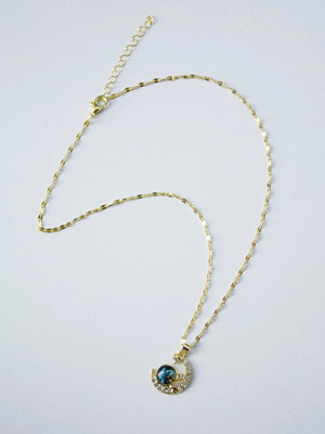 Stainless steel necklace like new with crescent moon and blue sphere