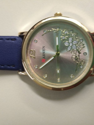 Women's watch new with blue strap and gold details