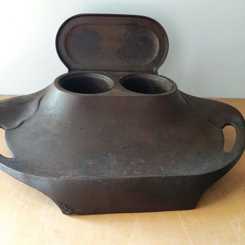 Vintage metal inkwell with ink bottle used