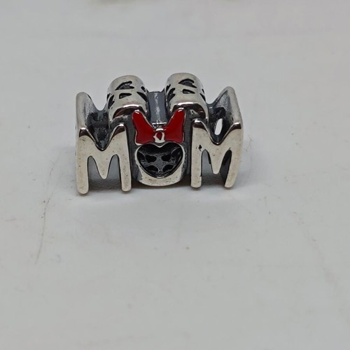 Disney Minnie Mouse "MOM" Silver Charm S925 like new with Red Bow