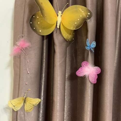 Decorative butterflies like new, yellow, pink, and sky blue for crafts