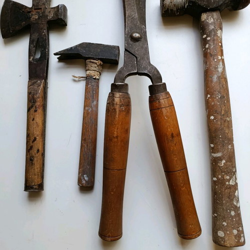 Set of old handmade tools used with wooden handles
