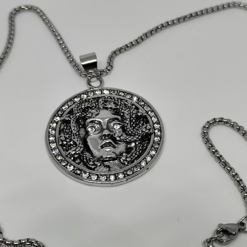 Medusa Pendant in Steel like new with rhinestones and chain