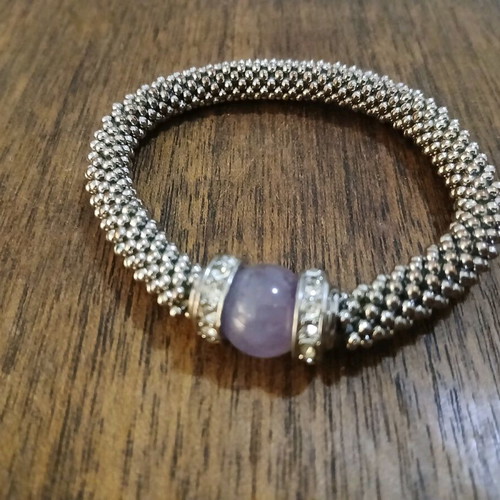 Women's bracelet with purple stone and white gems like new
