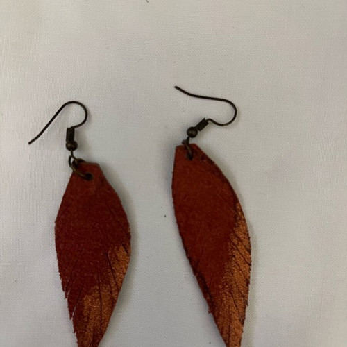 Leather earrings like new with gold color coating