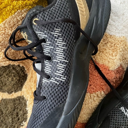Nike athletic shoes size 42.5 used, black and gold