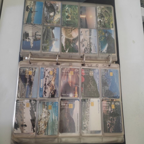 Phone Card Album like new with 100 cards of various themes