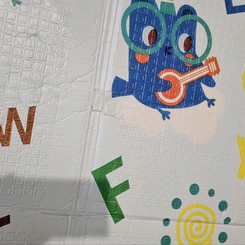 Children's play mat with animal and alphabet design