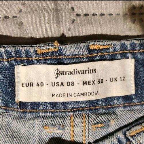 Stradivarius denim skirt like new, size 40 UK12, blue with frayed hem