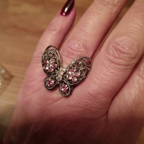 Butterfly adjustable ring like new