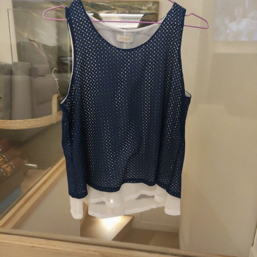 Matis top medium like new with lasercut design white and blue