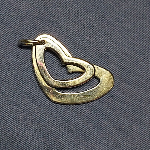 Jewelry used, metal heart Folli Follie, not silver