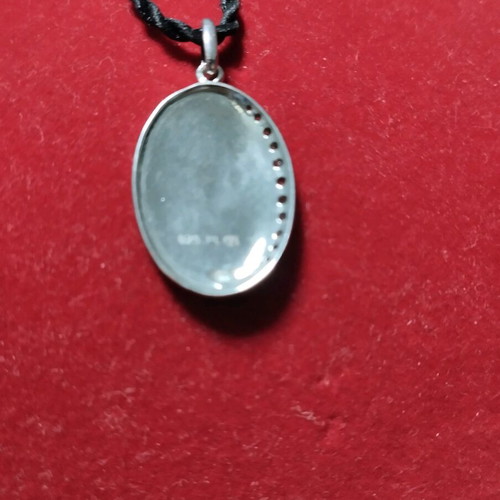 Galerie Tsangarakis silver pendant like new with white sapphires