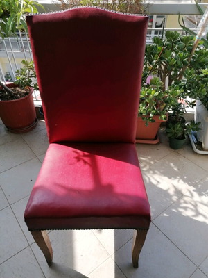 Vintage chair used dark red with minor wear