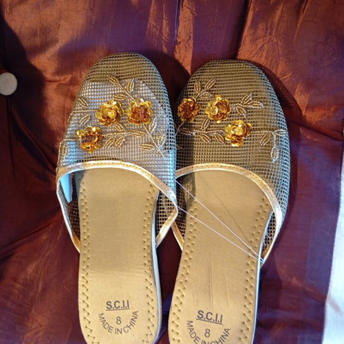 Slippers new, gold color
