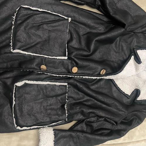 Women's mouton coat used black with white fur and wooden buttons