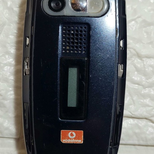 Sharp GX25 cell phone used blue with camera up to 7.9 MPixel