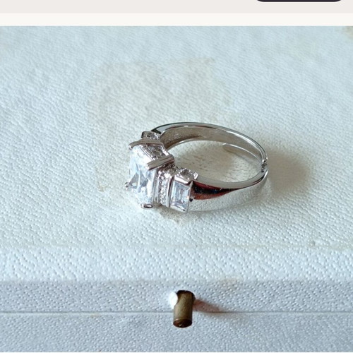 Galerie Tsangarakis rings with white sapphires like new, plated silver
