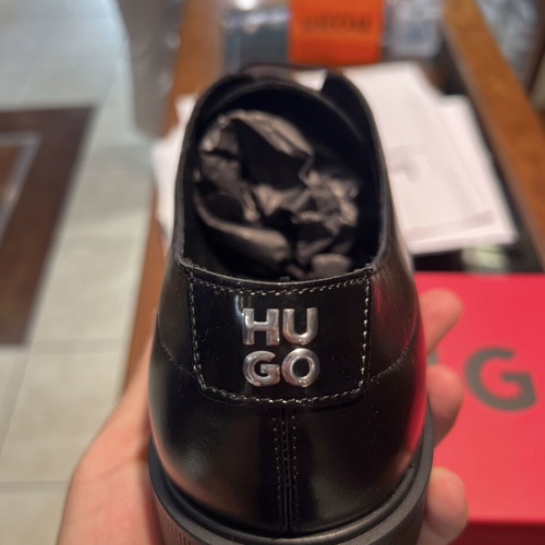 Hugo Boss men's black leather shoes like new, size 44
