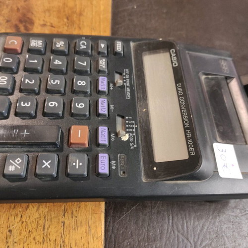 Casio calculator with paper used, battery operated