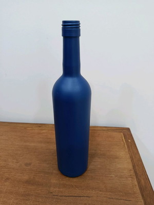 Painted bottle used with minor wear