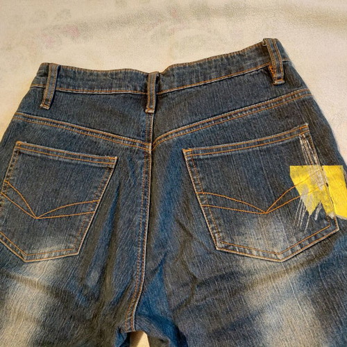 Jeans like new with colorful geometric details