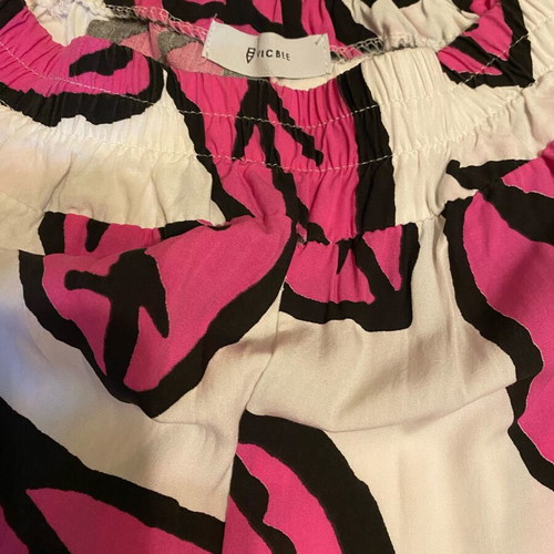 Printed pants like new, pink with elastic waist