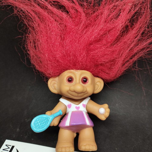 Troll Tennis Player figure with fuchsia hair and eyes